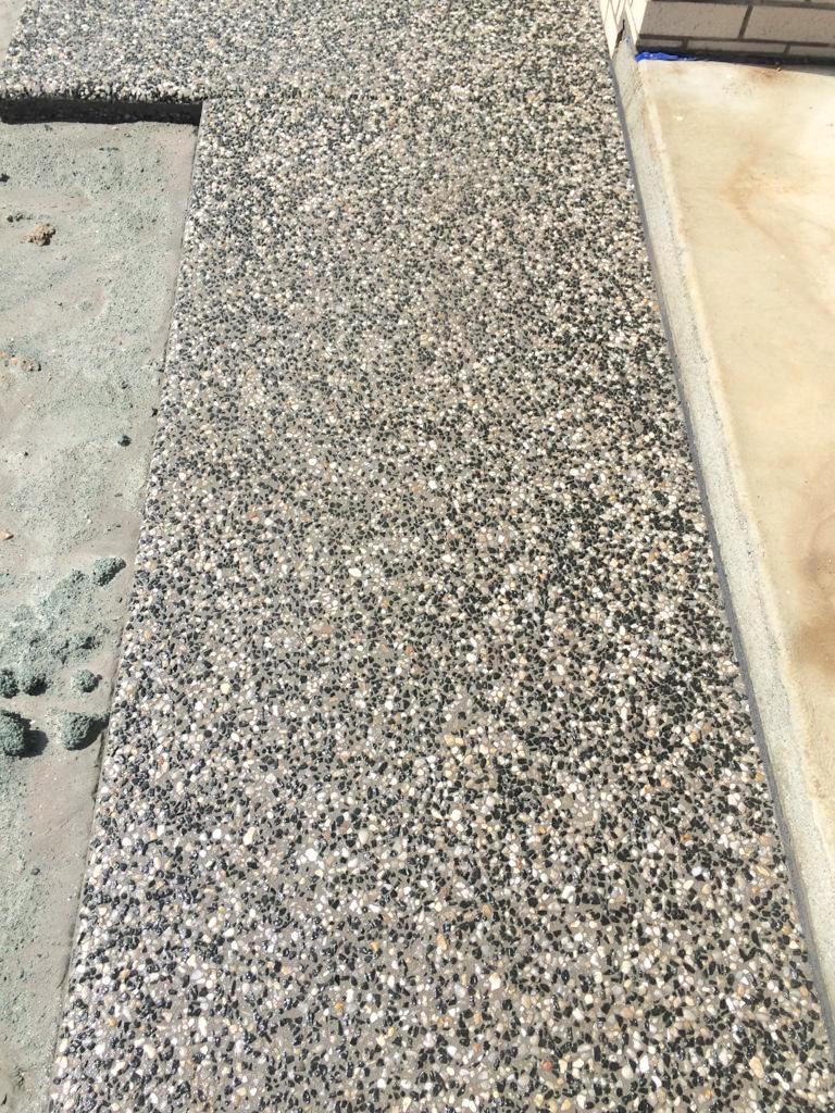 house surrounds exposed aggregate